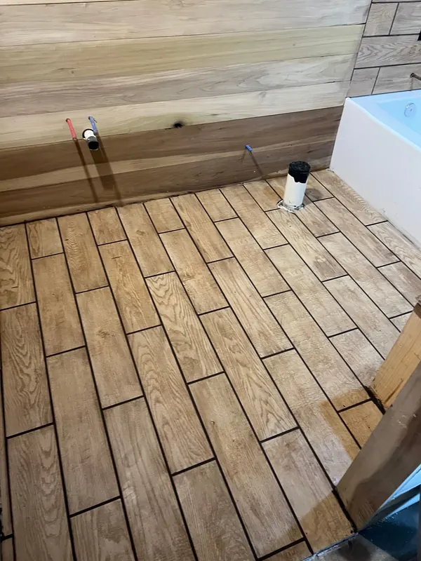 Plank tile bathroom floor