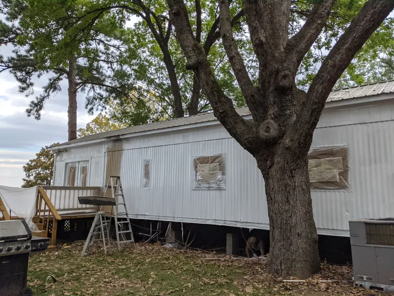 Before: manufactured home exterior
